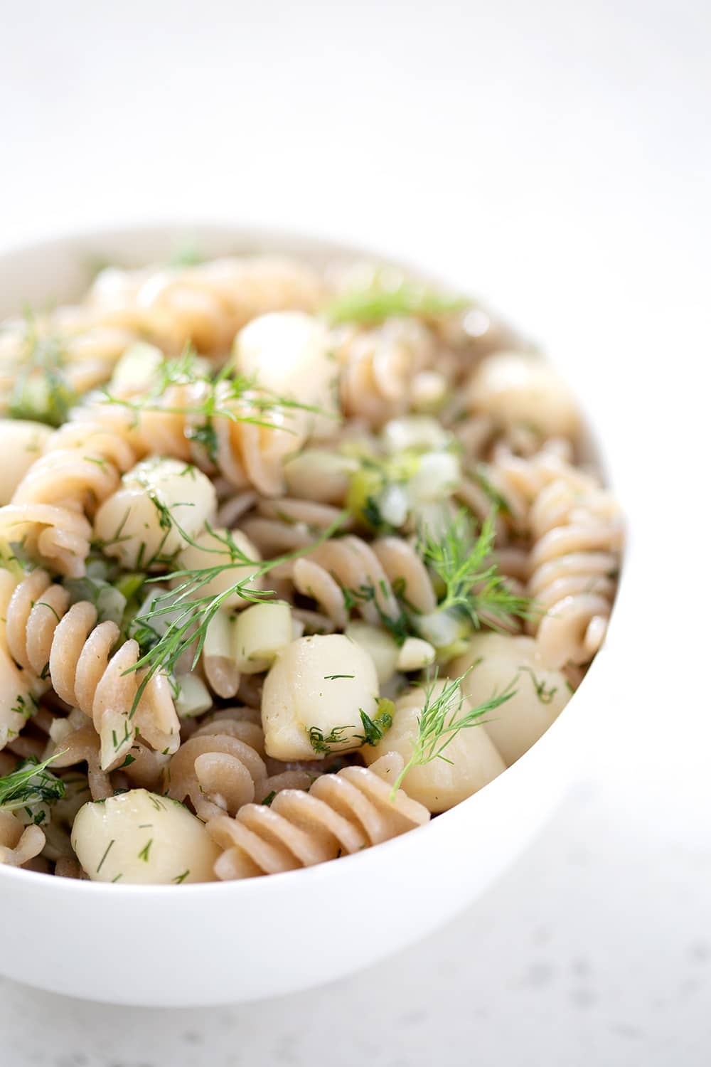 close up image of dill scallop AIP pasta