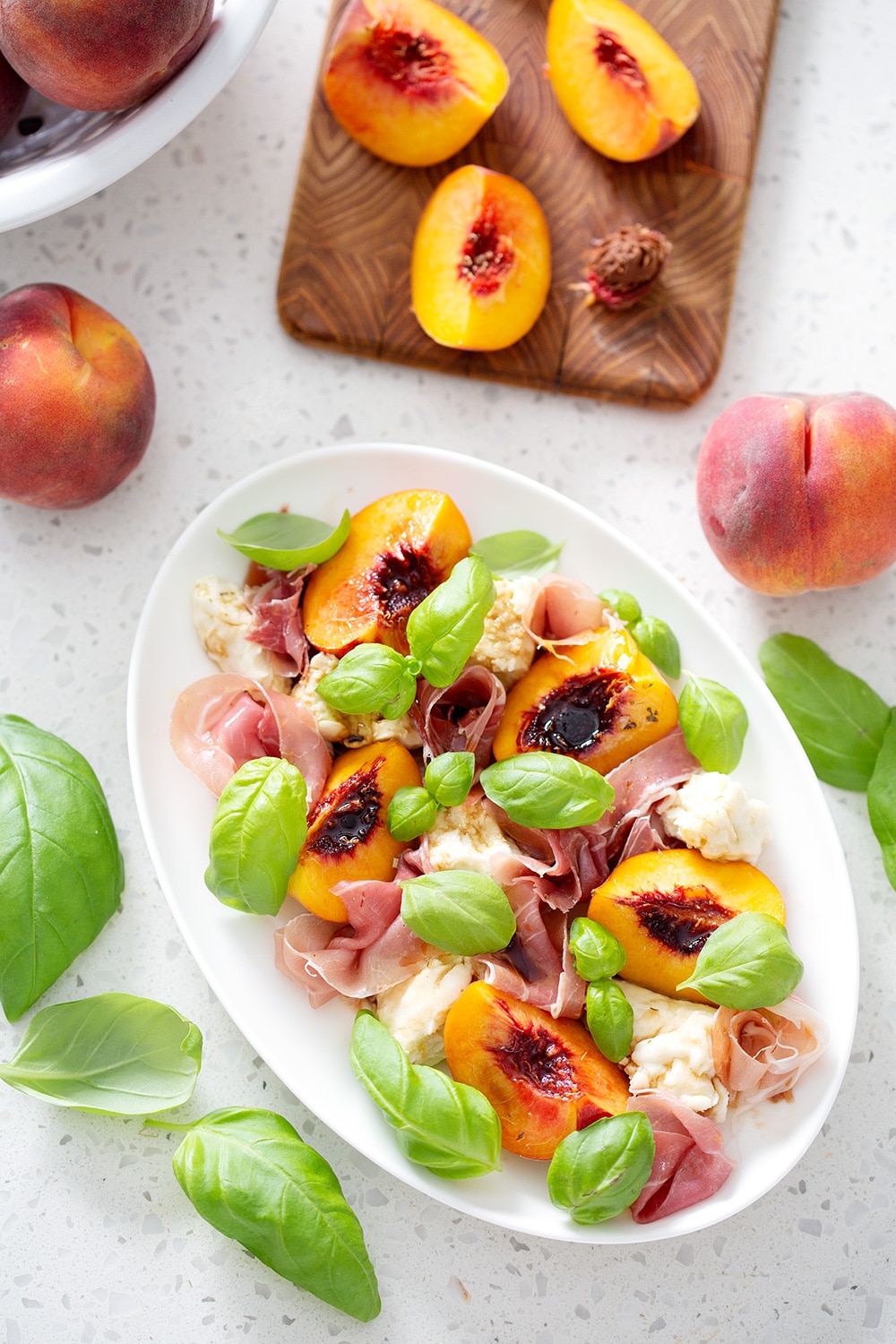 peach and prosciutto caprese salad